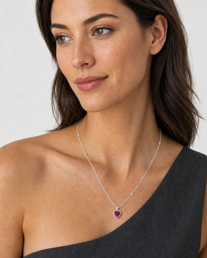 Alternate portrait wearing the Maelle silver heart station necklace
