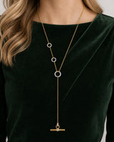 Eye-free front portrait of Gabrielle wearing the Marais mixed-metal lariat
