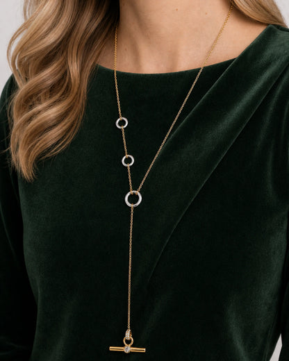 Eye-free oblique portrait of Gabrielle wearing the Marais crystal lariat
