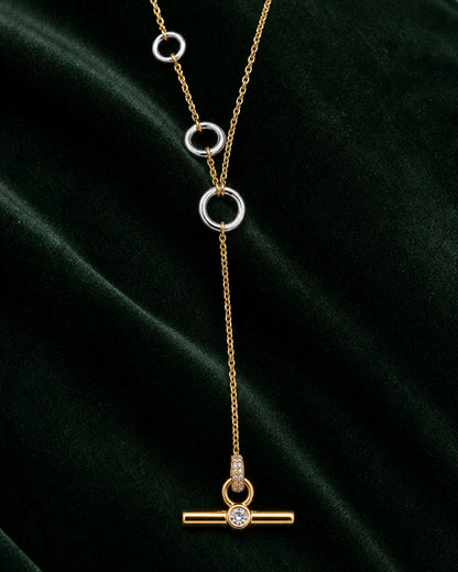 Complete worn macro of the Marais three silver rings, long drop and crystal T-bar