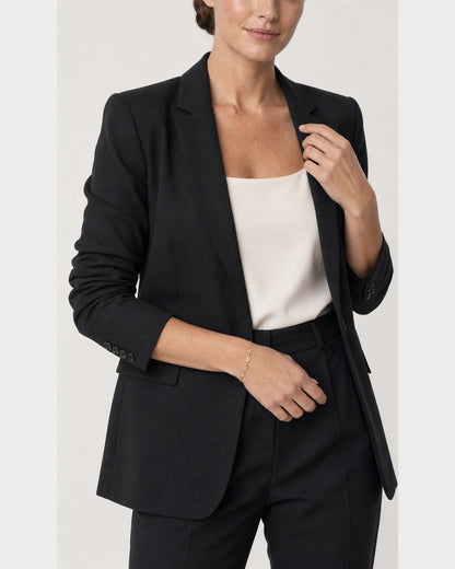 Human-scale view of the Maren Mama bracelet with black tailoring