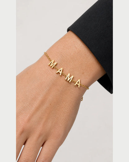 Extreme on-body macro of the Maren bracelet and separate M A M A charms