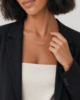 Human-scale view of the model touching the Mira necklace chain
