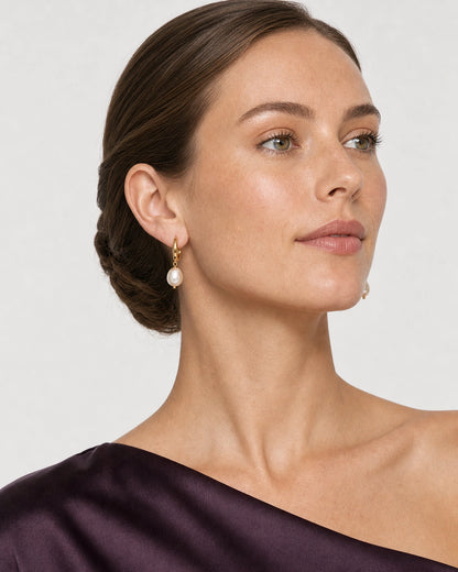 Alternate profile portrait wearing the Mirelle gold and pearl earrings