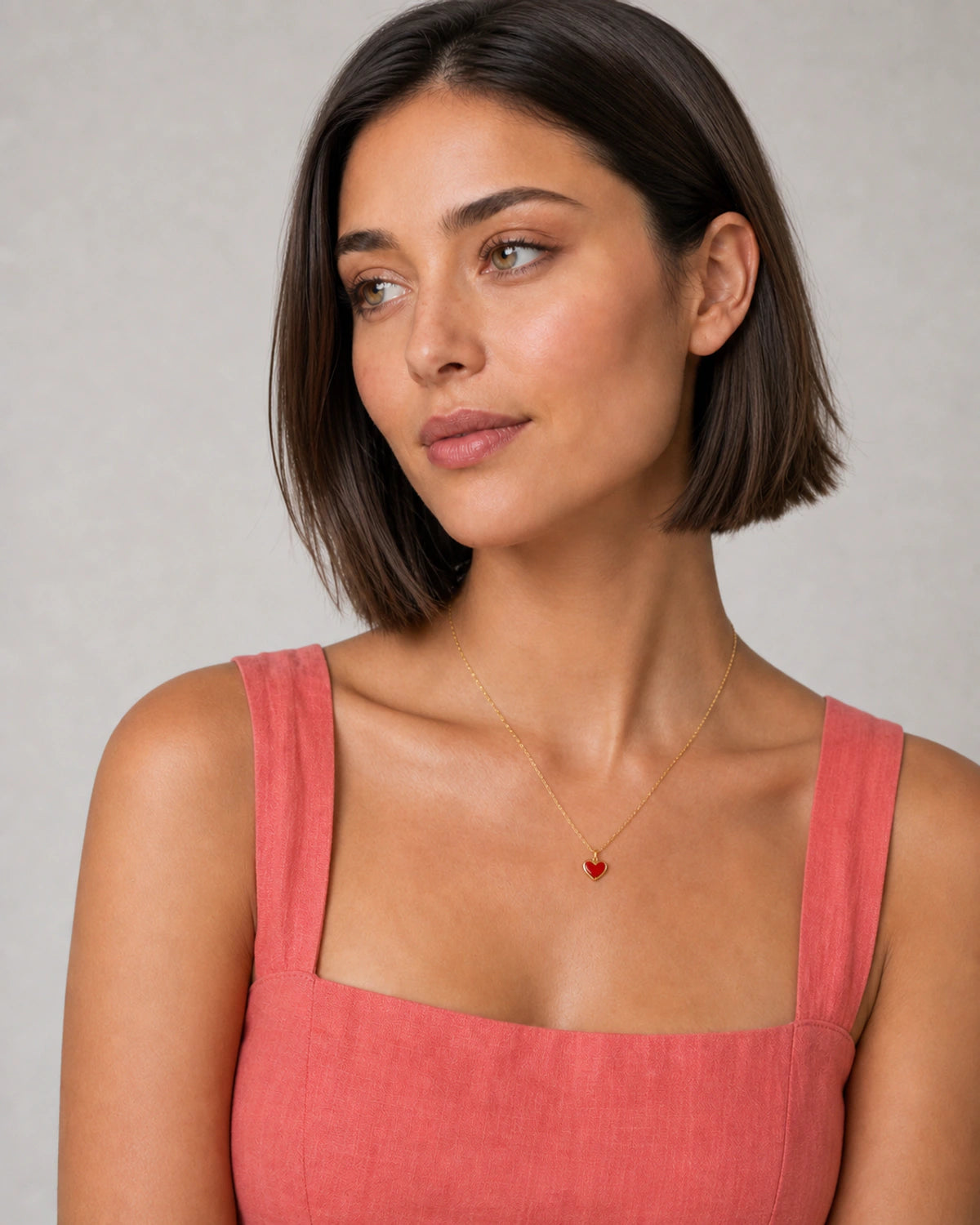 Alternate European-summer portrait featuring the Noemie crimson heart pendant