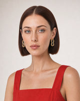 Alternate European-summer portrait featuring the Nysa gold and silver earrings