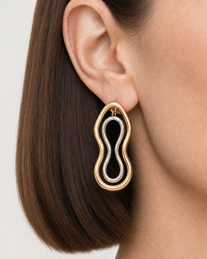Extreme ear macro of the Nysa mixed-metal sculptural earring