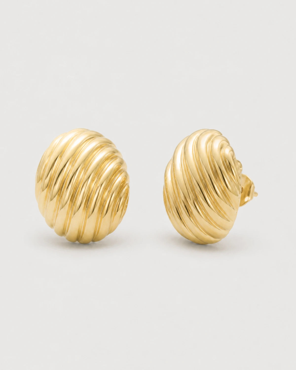 Alternate angle showing the convex oval profile of the Odette earrings