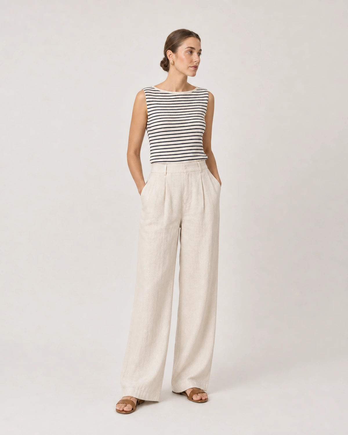 Wide studio portrait in Breton knit and ecru linen featuring Odette earrings