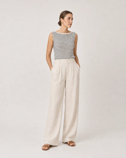 Wide studio portrait in Breton knit and ecru linen featuring Odette earrings