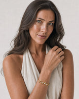 Alternate European-summer portrait featuring the Onda three-stone wave cuff