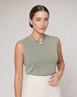 Human-scale summer portrait showing the Orra silver bean cord necklace