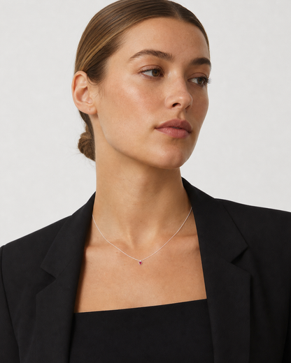 British model wearing the Rosalie silver red heart necklace