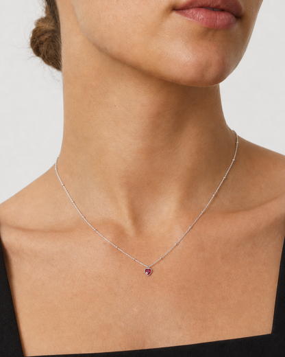 Close neckline view of the Rosalie silver beaded heart necklace