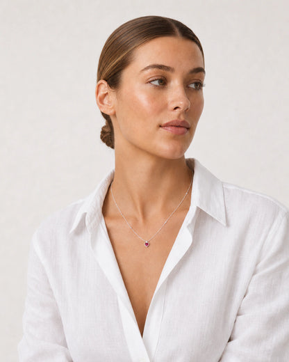Alternate European-summer portrait featuring the Rosalie silver beaded heart necklace