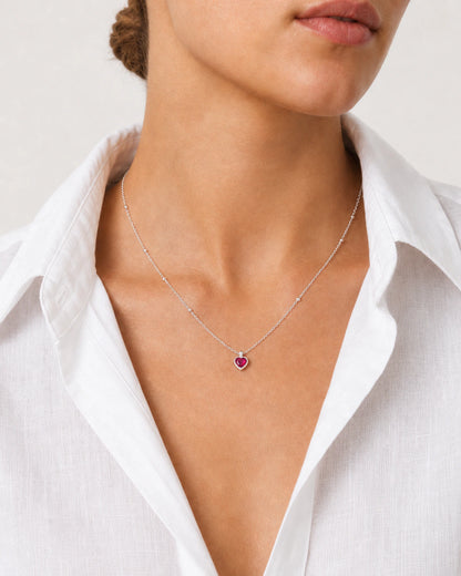 Close neckline view of the Rosalie silver beaded ruby-red heart necklace