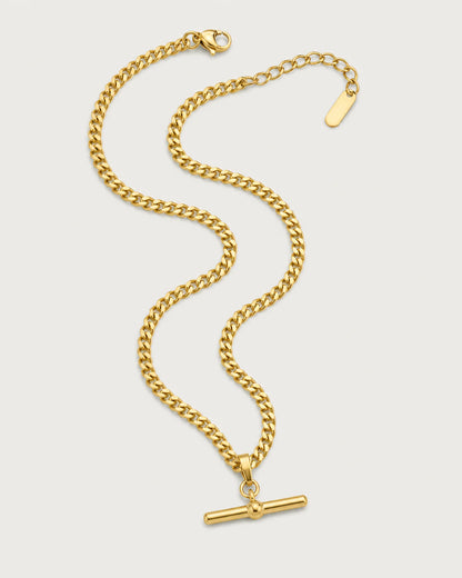 Sabine gold-tone curb T-bar necklace in an alternate arrangement on pale grey