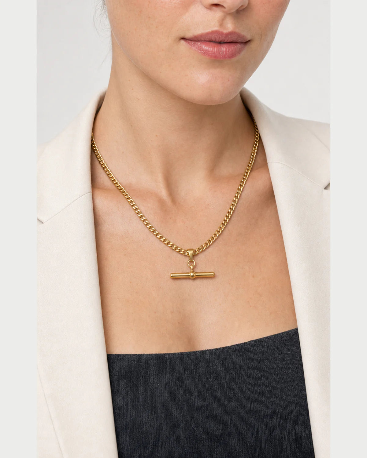 Clean neckline close-up showing the scale of the Sabine necklace