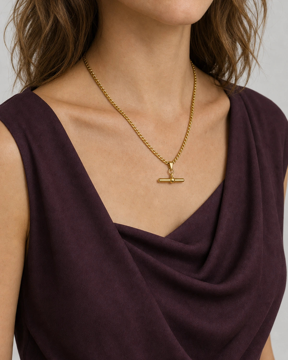 Eye-free three-quarter portrait of Evelyn wearing the Sabine necklace