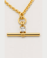 Macro view of the Sloane square crystal and polished gold toggle bar