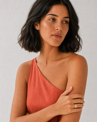 Alternate European-summer portrait featuring the Solenne gold A signet ring