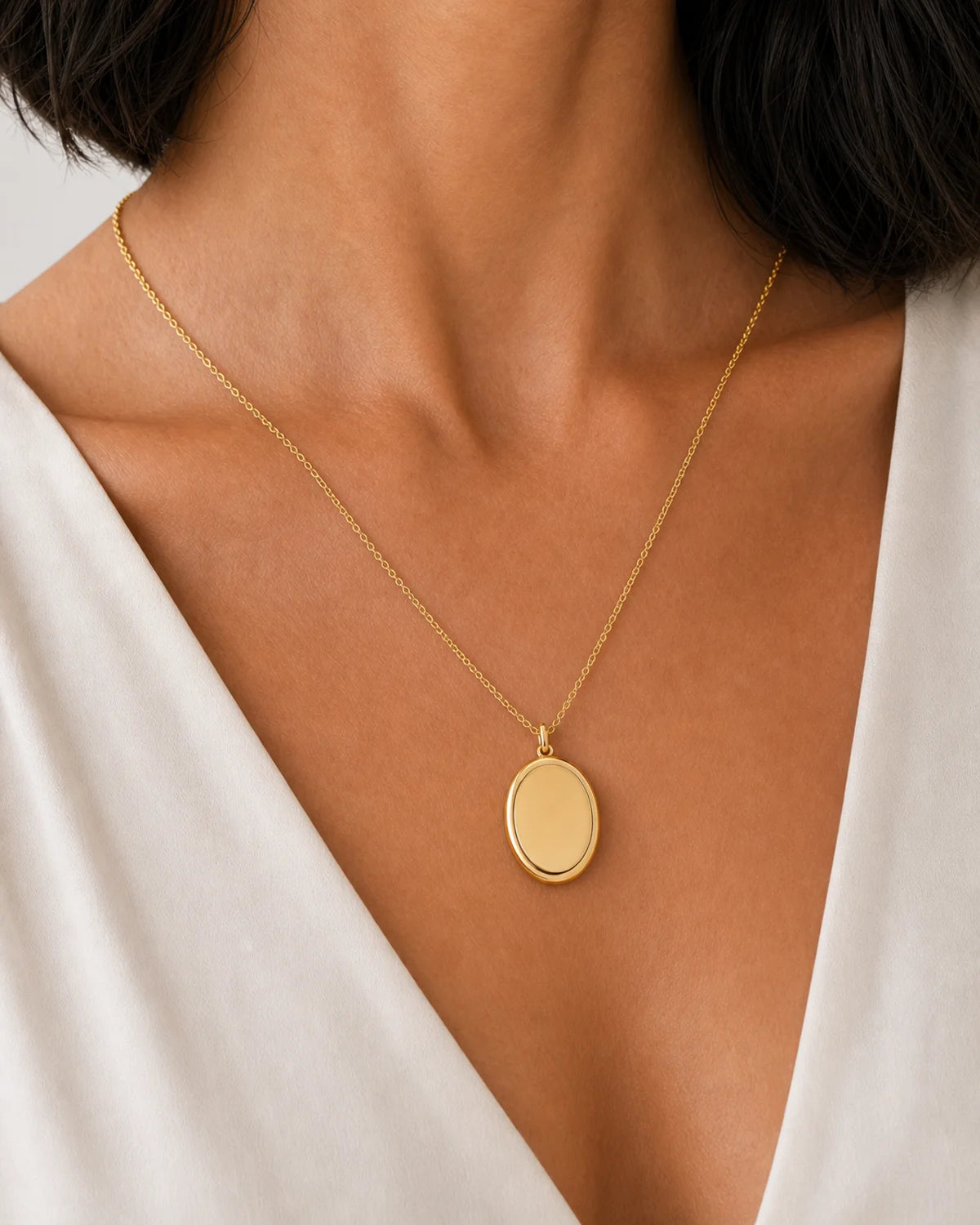 Clean neckline close-up of the Solenne blank polished oval pendant