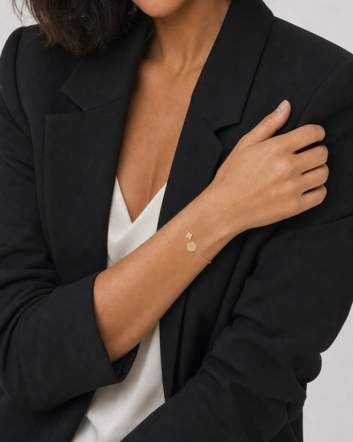 Alternate portrait of the same model wearing the Soline bracelet
