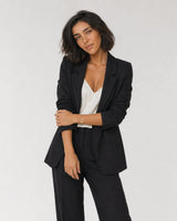 Wide pale grey studio portrait showing the Soline bracelet at natural scale