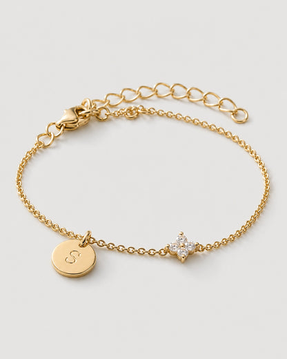 Alternate gold Soline bracelet view with clasp and extender on neutral grey