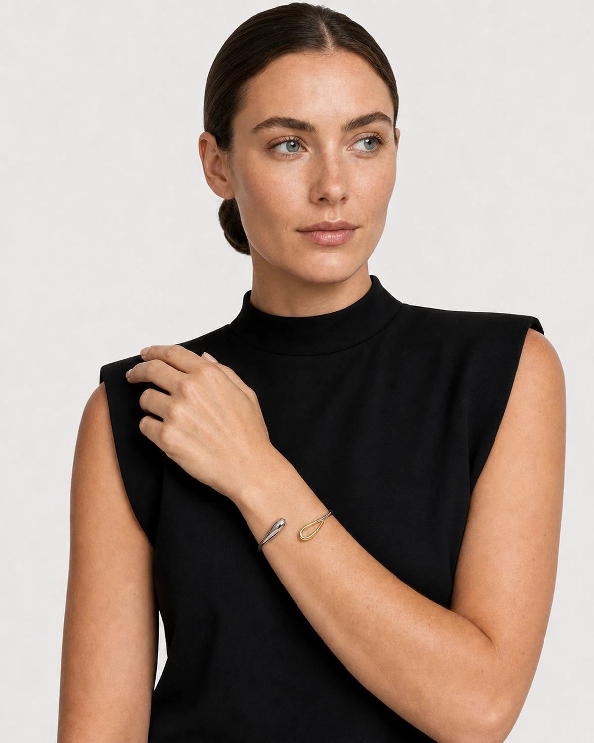 Alternate portrait of the same model wearing the Sora bangle