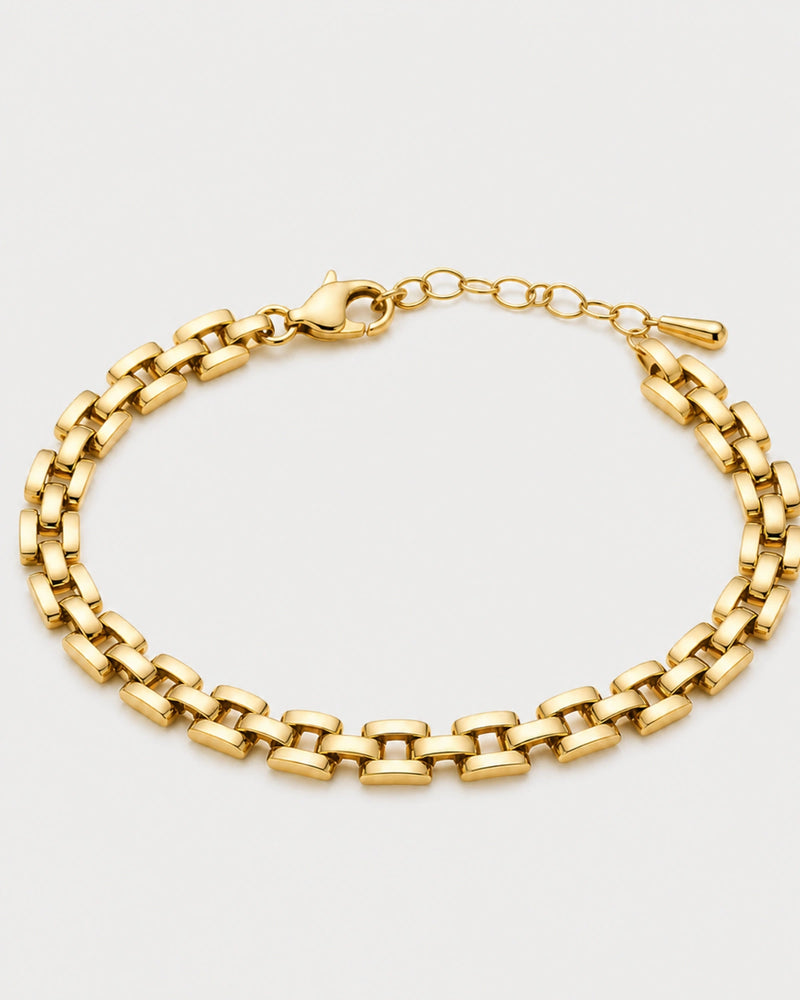 Talia gold timepiece link bracelet on warm soft ivory