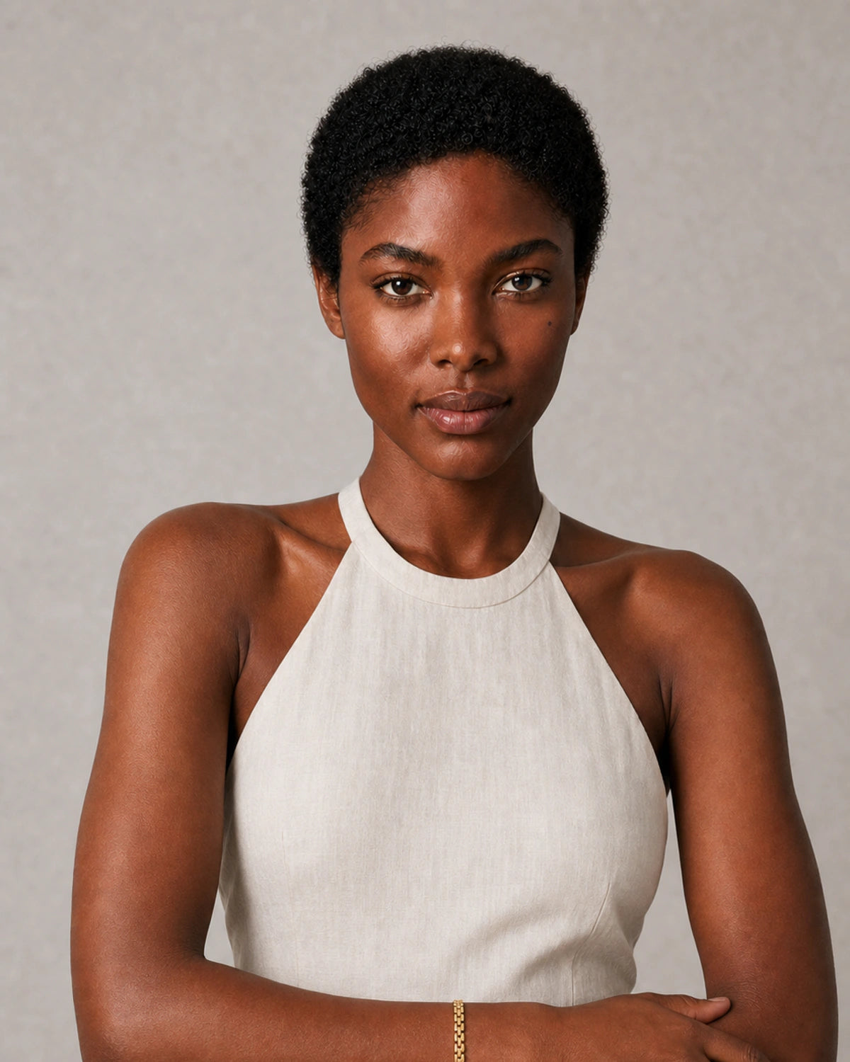 Human-scale portrait showing the slim Talia timepiece-link bracelet