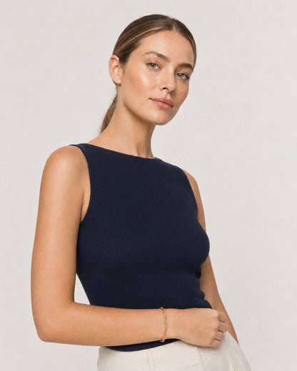 Alternate French Riviera portrait featuring the Vela gold paperclip bracelet