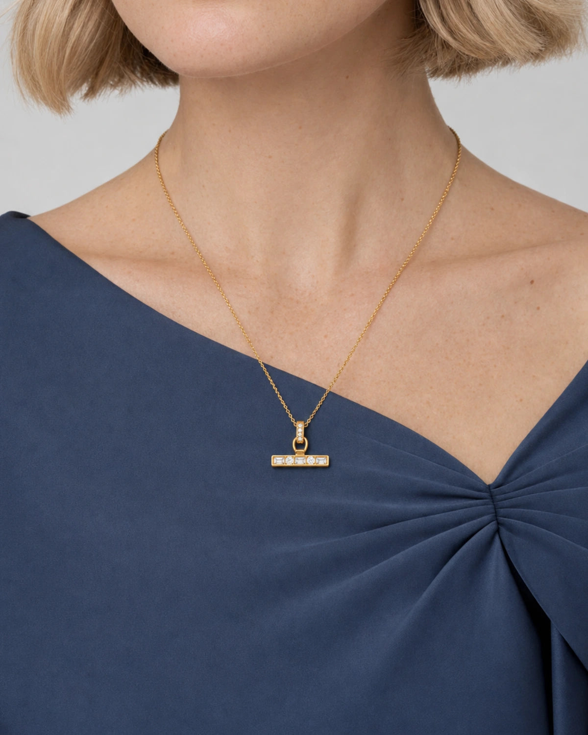 Eye-free front portrait of Margot wearing the Vienne crystal T-bar necklace