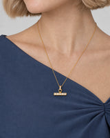 Eye-free oblique neckline view of Margot wearing the Vienne crystal necklace