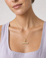 Close wearing view of the Vienne crystal bail and alternating five-stone bar
