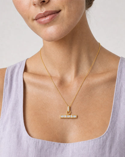Close wearing view of the Vienne crystal bail and alternating five-stone bar